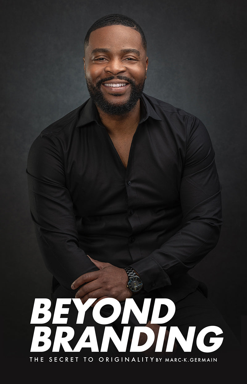 Smiling man wearing a black shirt sitting against a dark background with "Beyond Branding" text below.